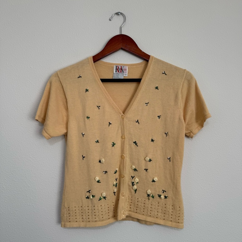 Yellow cardigan with floral embroidery